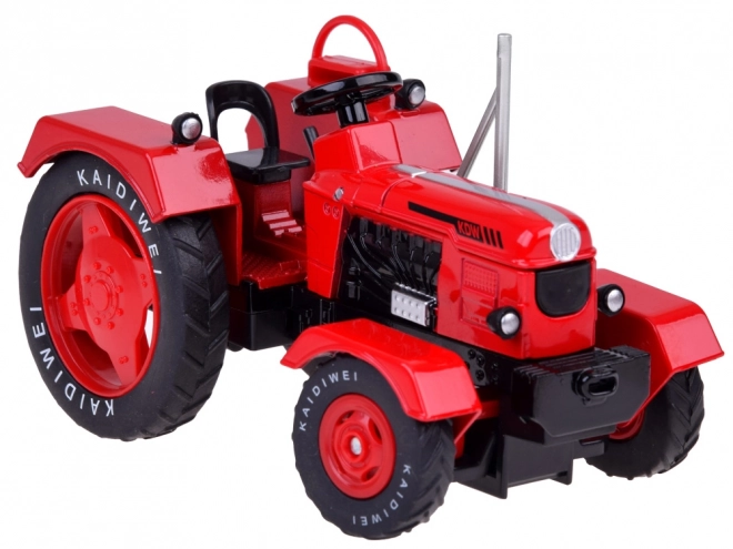 Crveni metalni traktor s gumenim kotačima 1:18