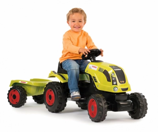 Pedalni traktor CLAAS Arion 400 s prikolicom zelen