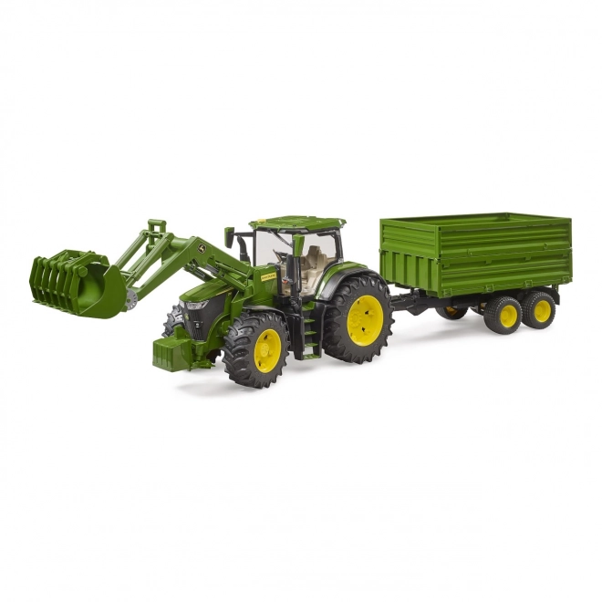 Traktor John Deere 7R s prednjim utovarivačem i prikolicom