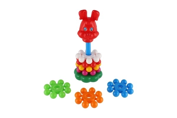 Složena piramida s prstenovima plastika 26cm u mrežici 12m+