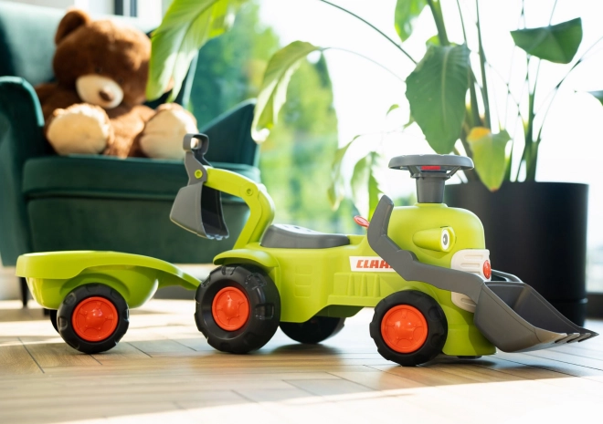 Vozeći traktor Claas s prikolicom, utovarivačem i lopatom