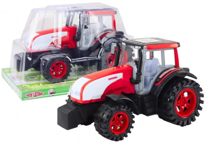 Veliki poljoprivredni traktor s pogonom crveni