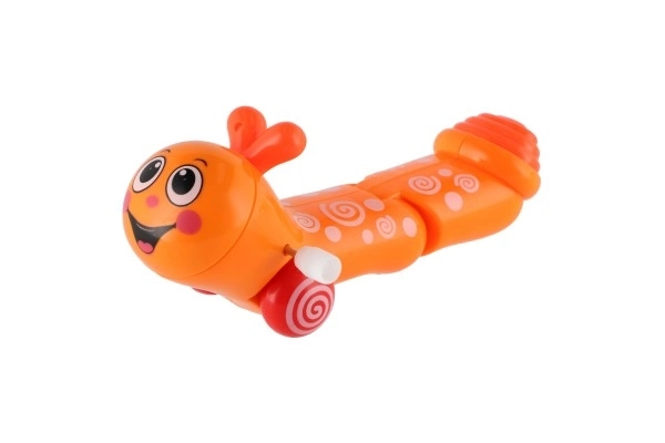 Namotani crvić koji puže, plastika 13cm, 6 boja, 12 komada u kutiji
