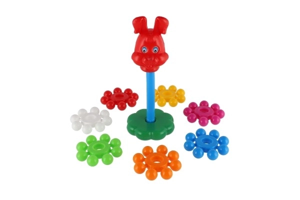 Složena piramida s prstenovima plastika 26cm u mrežici 12m+
