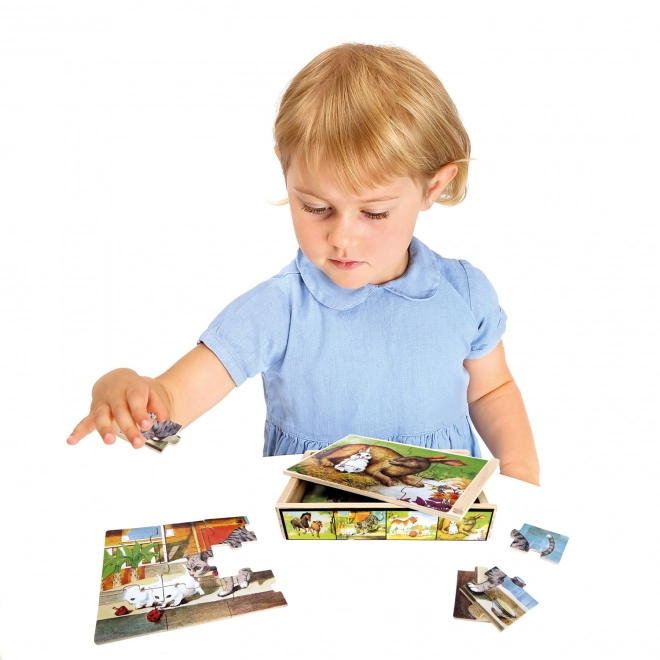 Drvene puzzle životinje u kutiji