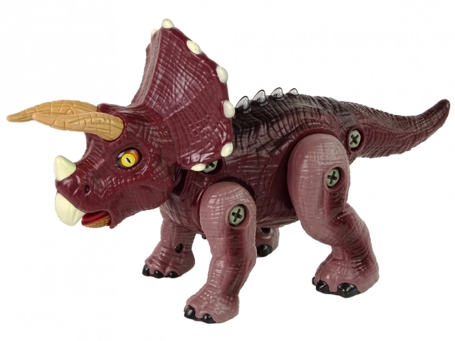 Plastični dinosaurus na sklapanje s bušilicom