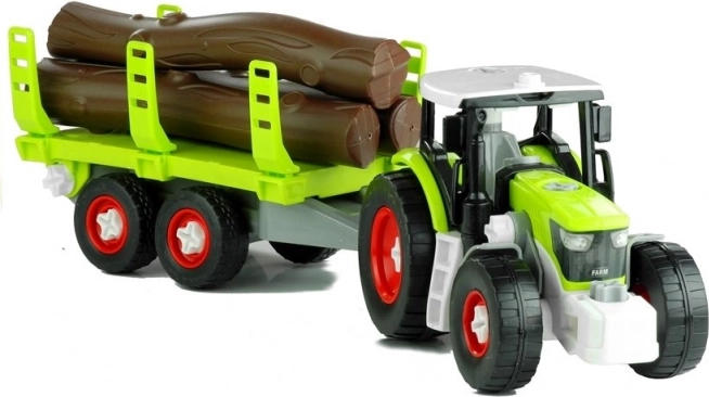 Sklopivi traktor s prikolicom za drvo