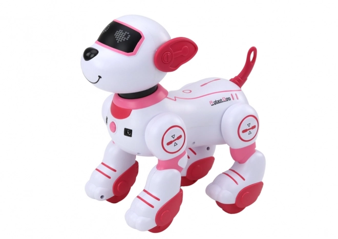 Interaktivni robot pas pleše na daljinsko upravljanje ispunjava naredbe ružičasti