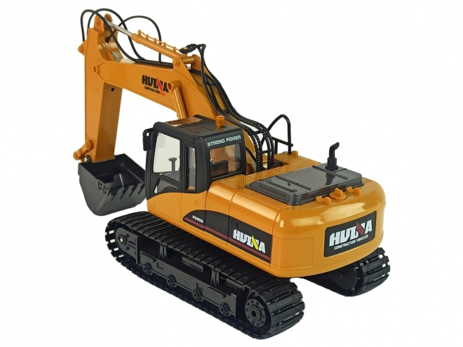 Žuti RC bager Caterpillar 1:14 na daljinsko upravljanje