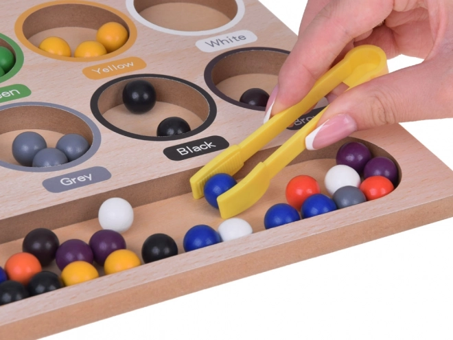 Drvena edukativna mozaik Montessori - šarene kuglice i sortirka