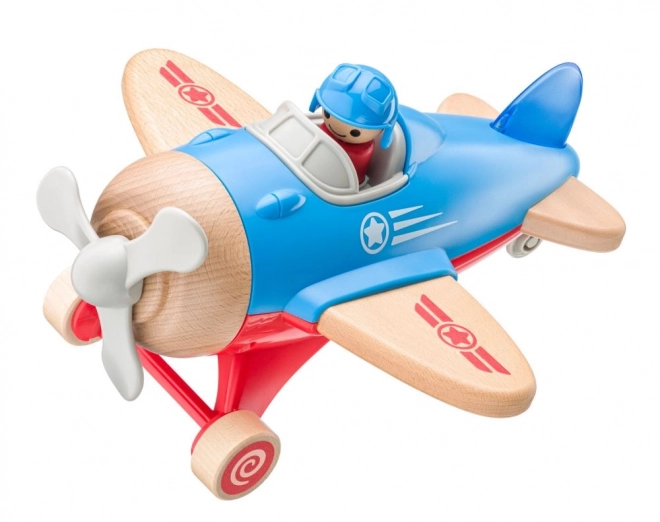 Veliki igrački avion s pilotom, svijetli i proizvodi zvukove