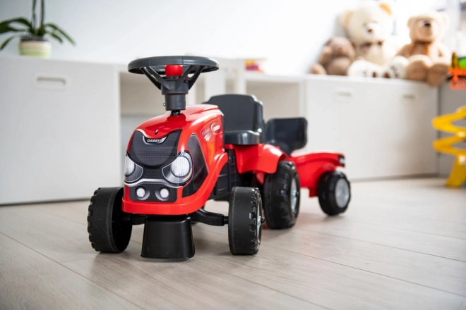 Vozeći traktor Baby Case IH crveni s prikolicom