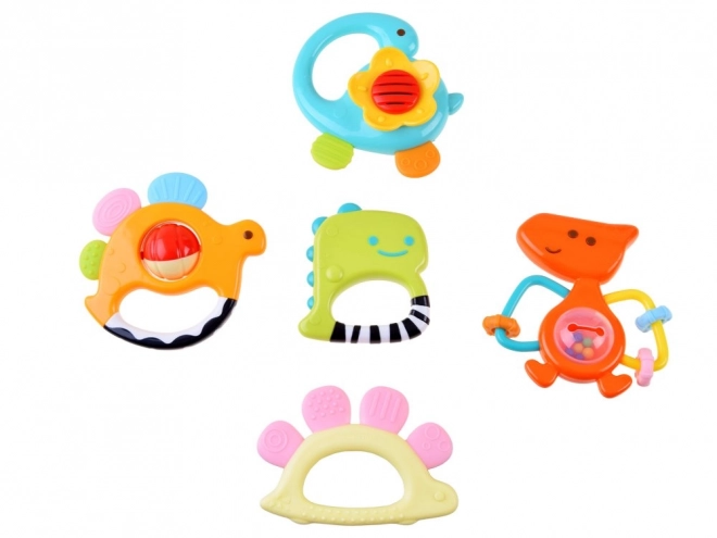 Set 5 zvečkica i grickalica Dinosaurusi