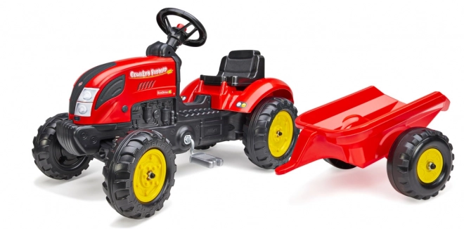Pedalni traktor s prikolicom crveni