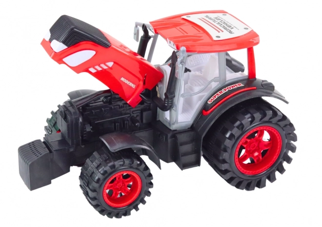 Veliki traktor s prikolicom i balama sijena