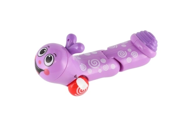 Namotani crvić koji puže, plastika 13cm, 6 boja, 12 komada u kutiji