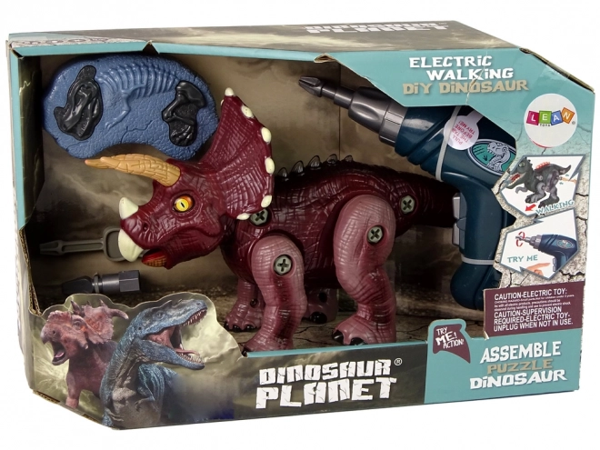 Plastični dinosaurus na sklapanje s bušilicom