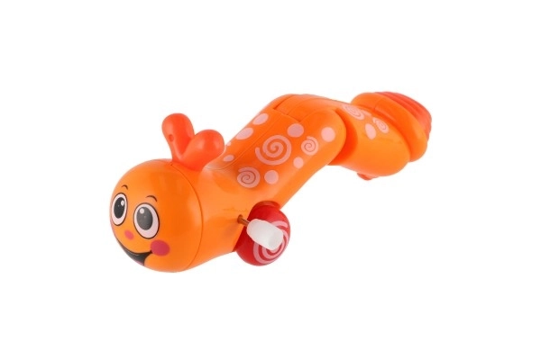 Namotani crvić koji puže, plastika 13cm, 6 boja, 12 komada u kutiji