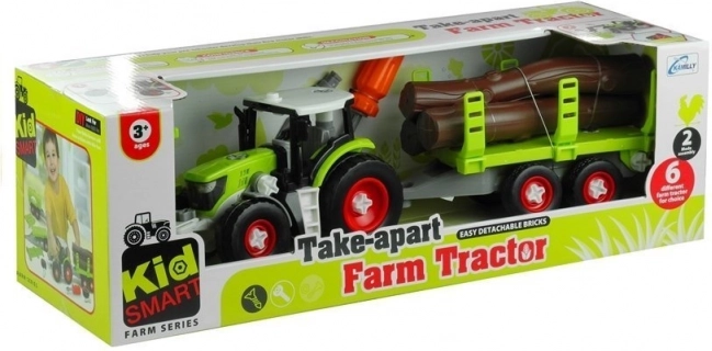 Sklopivi traktor s prikolicom za drvo