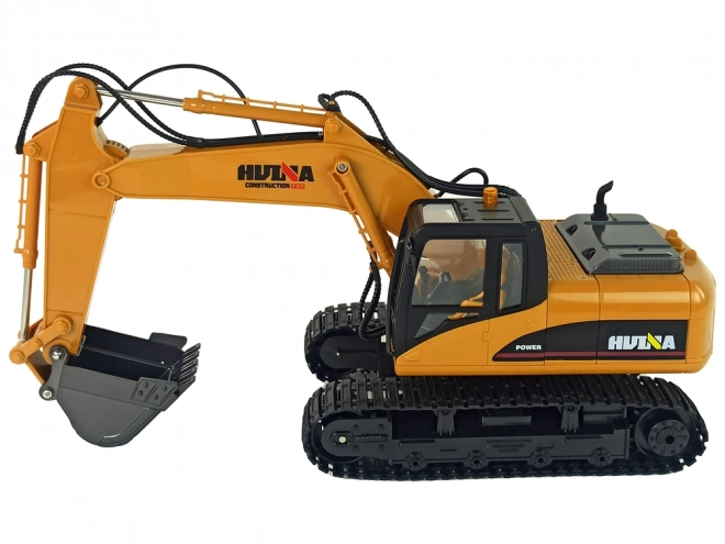 Žuti RC bager Caterpillar 1:14 na daljinsko upravljanje