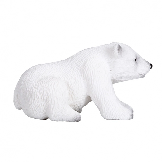 Figurica polarne medvjedice koja sjedi