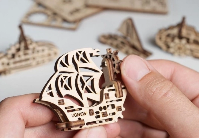 Ugears 3D drvene mehaničke puzzle - četiri mehanička privjeska