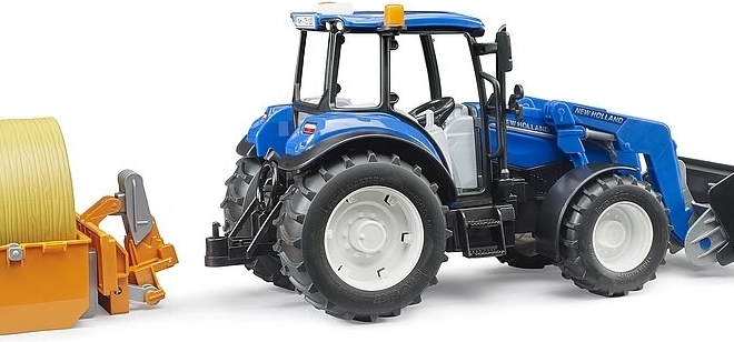 Bruder traktor New Holland T5.120 s prednjim utovarivačem i prikolicom