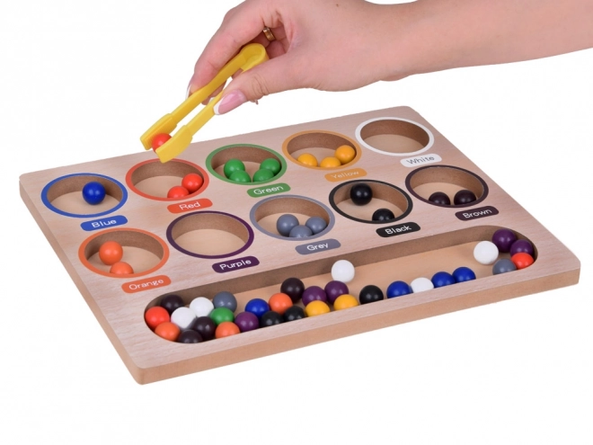 Drvena edukativna mozaik Montessori - šarene kuglice i sortirka