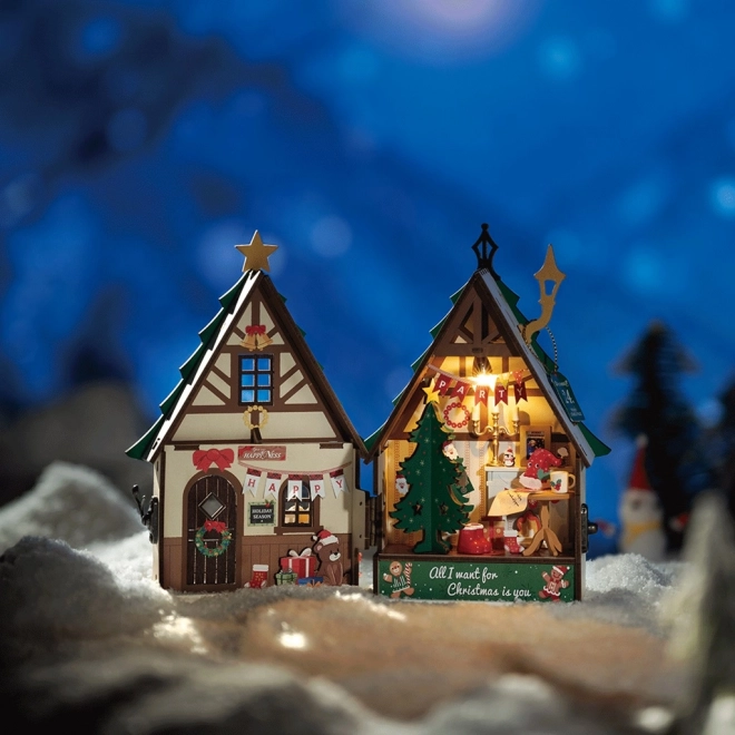 Miniatura svjetleće božićne kućice