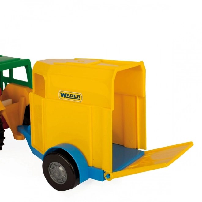 Traktor s prikolicom za konje