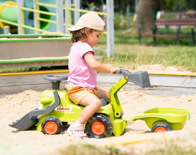 Vozeći traktor Claas s prikolicom, utovarivačem i lopatom