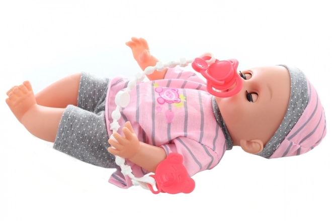 Beba koja piški 28 cm sa zvukovima i dodacima