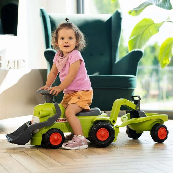 Vozeći traktor Claas s prikolicom, utovarivačem i lopatom