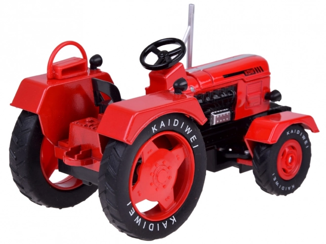Crveni metalni traktor s gumenim kotačima 1:18