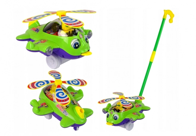 Zeleni gurni helikopter s pilotom