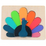 Drvene umetaljke puzzle Paun od Vilac