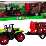 Zeleni farmerski traktor s prikolicom za trupce