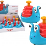 Sretan puž na kotačima na konjiću plavi i crveni