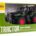 Zeleni traktor s hvataljkom